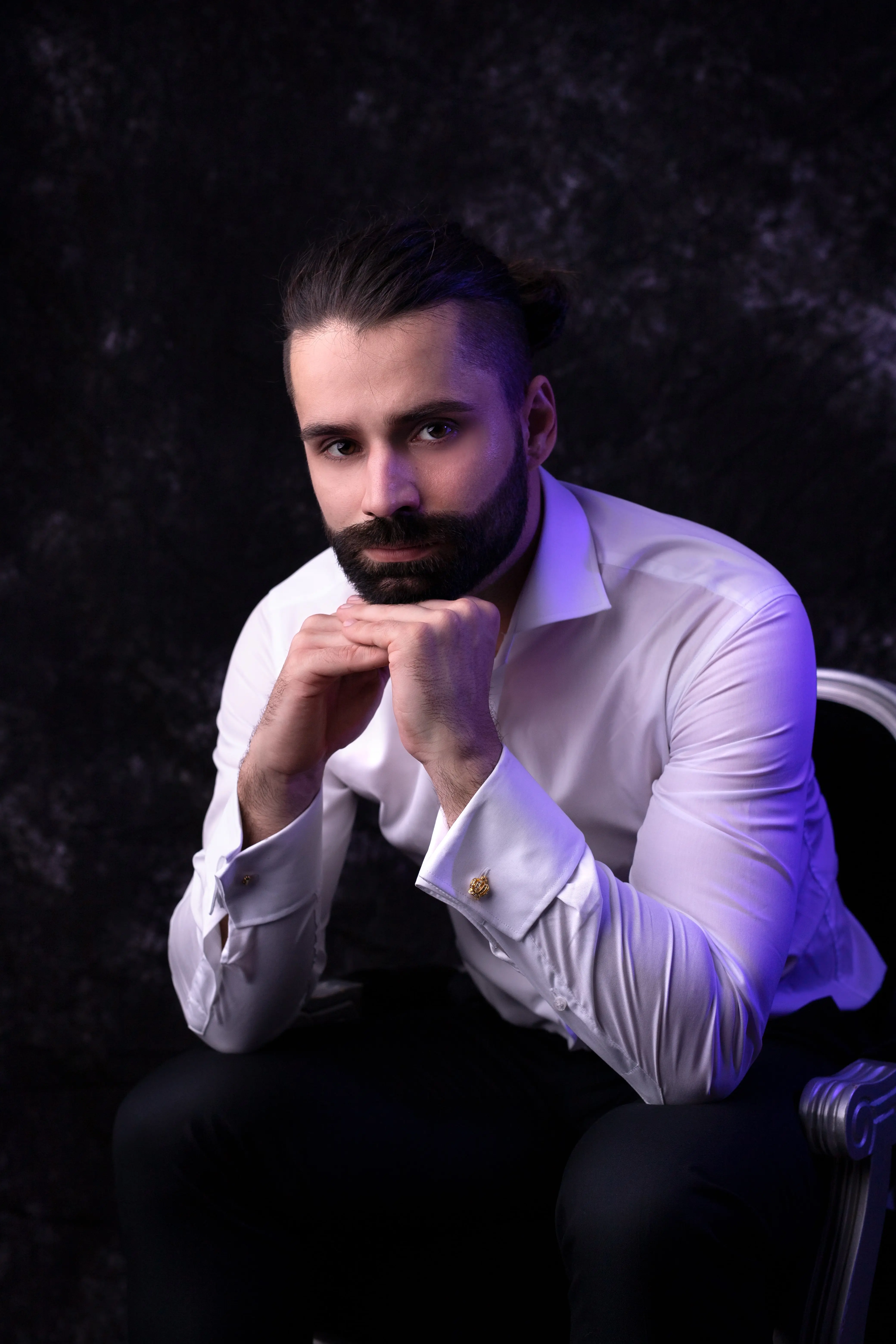 CEO photo - Patryk Czemierowski, man with beard in white shirt